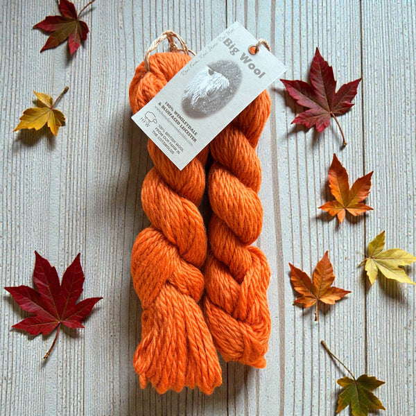 two skeins autumnal orange Wensleydale bulky wool