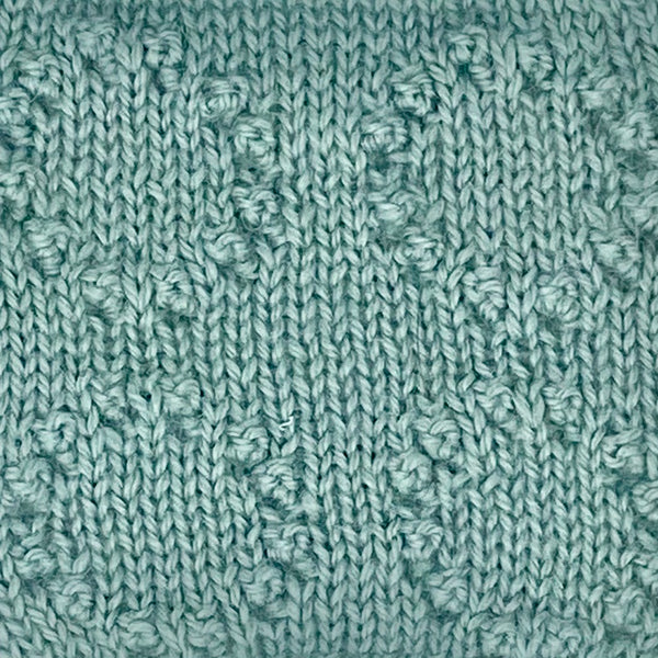 sample knitted from the home farm wensleydale wool dk, 8 ply, light worsted weight collection